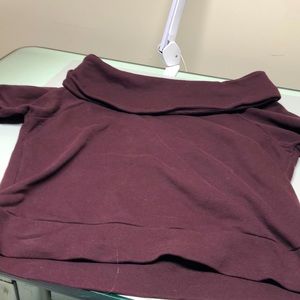 Sweatshirt that can be worn off the shoulders or on.